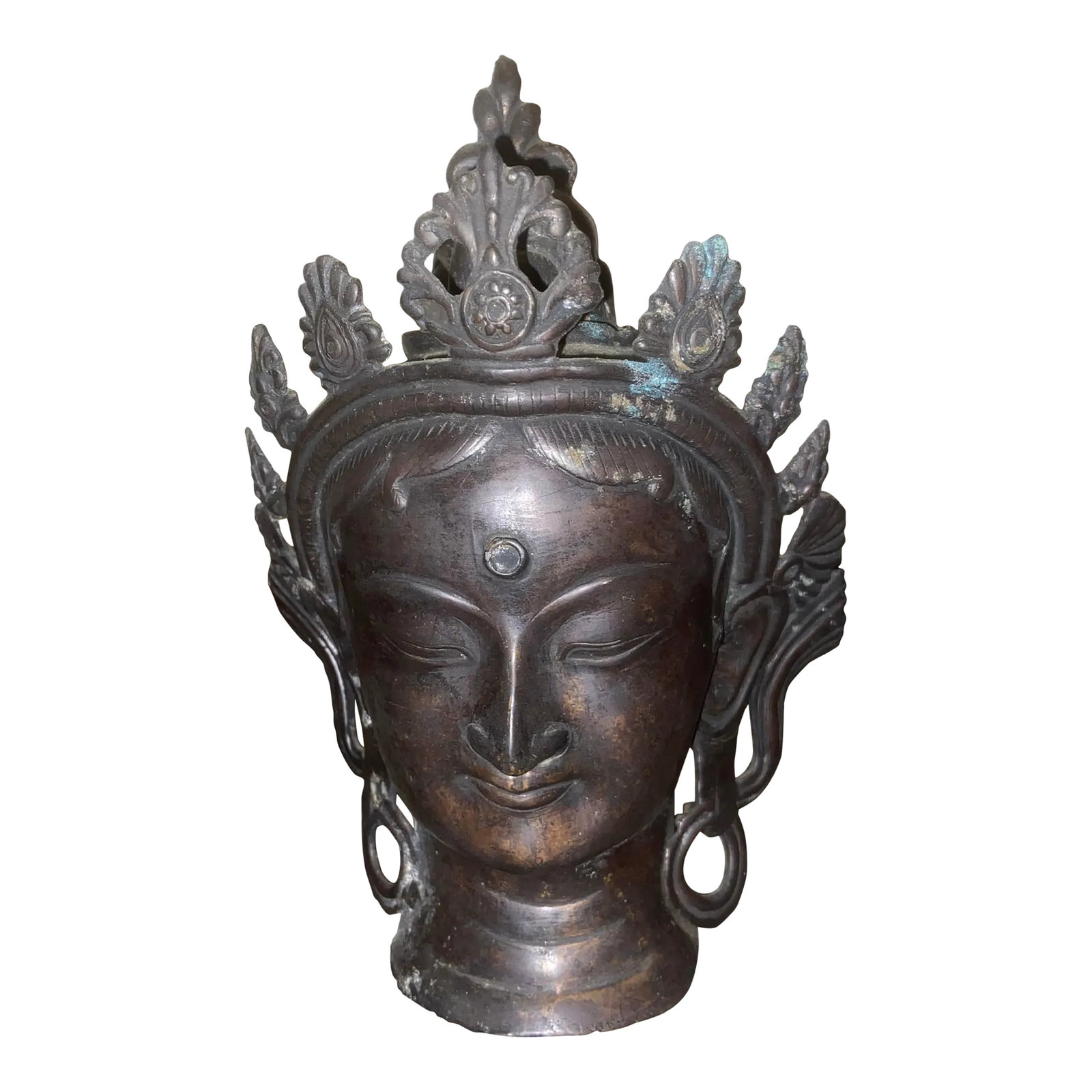 Early 20th Century Tibetan/Nepalese Bronze Bodhisattva Head - Hollow Cast: Antique hand-cast bronze head of a Buddhist bodhisattva in the Tibetan/Nepalese tradition. The figure features a serene closed-eye expression, elongated earlobes, urna (third eye), and an elaborate cr