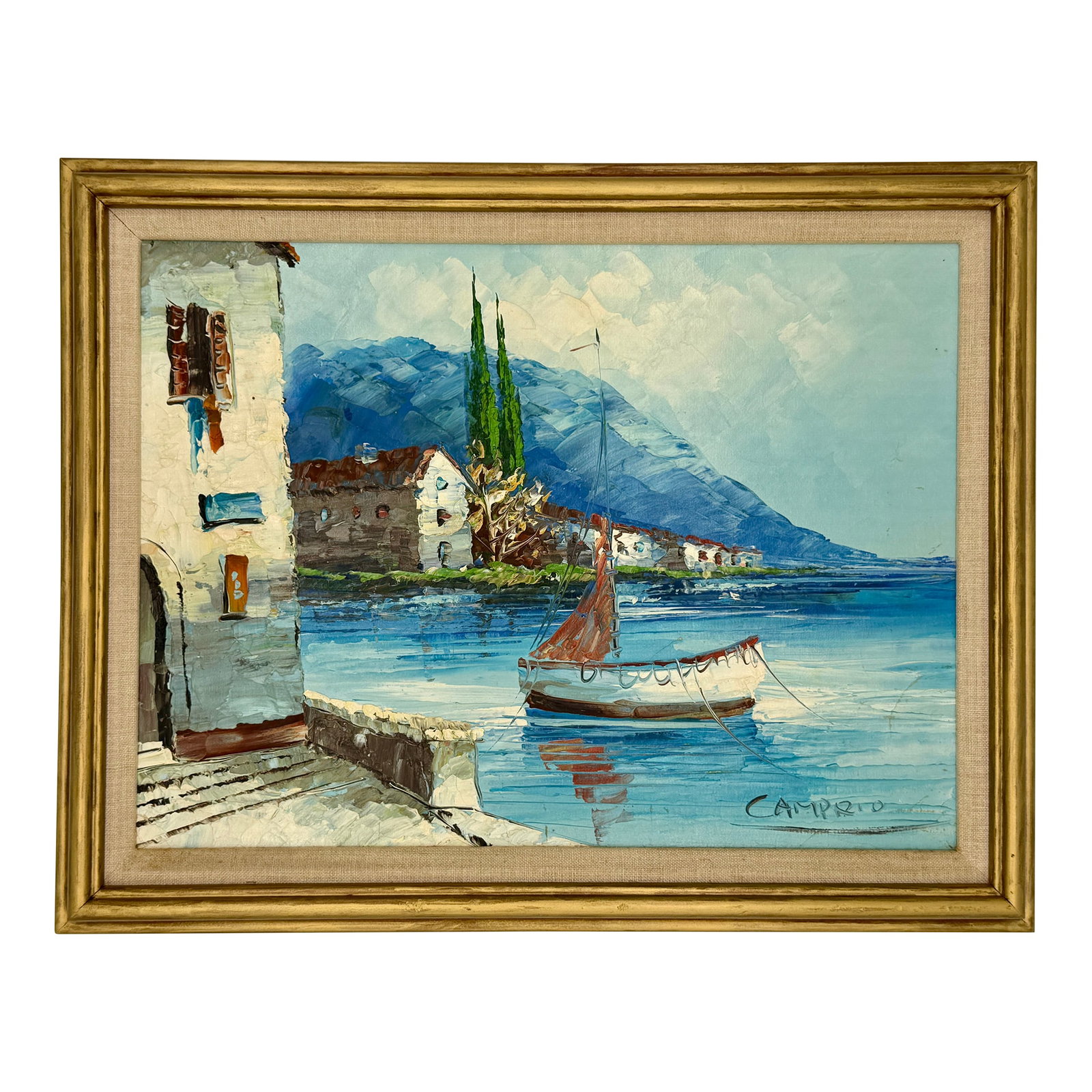Vintage Signed Giovanni Camprio Oil on Canvas Coastal Scene: An original vintage oil on canvas by Giovanni Camprio, this signed and framed painting depicts a sailboat at the water's edge within a tranquil coastal seascape. Executed in a contemporary style with