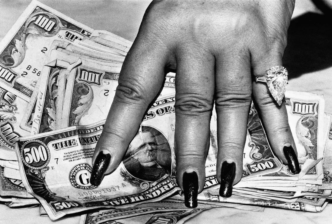 Fat Hand and Dollars, Monte Carlo 1985 by Helmut Newton: Fat Hand with Dollars, Monte Carlo 1986 16x20 Vintage Silver Gelatin Print by Helmut Newton. Limited availability in 16x20 size only. Helmut Newton left France in 1981 to reside in Monaco, he