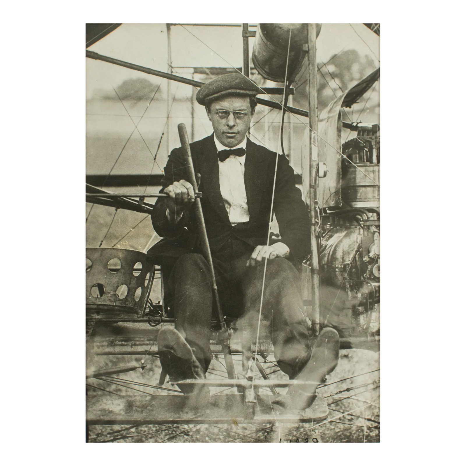 British Aeronaut EWC Perry circa 1910 - Silver Gelatin B & W Photograph by ROL: An original silver gelatin black and white photograph by Press Agency ROL, Paris circa 1910 British aeronaut E.W.C. Perry. We see here the aviator in an experimental machine from the beginnings of avi