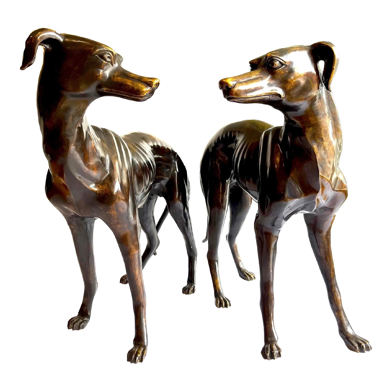 Life-Sized Italian Bronze Whippets Greyhounds - a Pair: Magnificent pair of life-size bronze whippets or greyhounds. One male. The other female. Each features finely cast, clearly defined details and beautiful patinated surfaces. Unsigned - we attribute