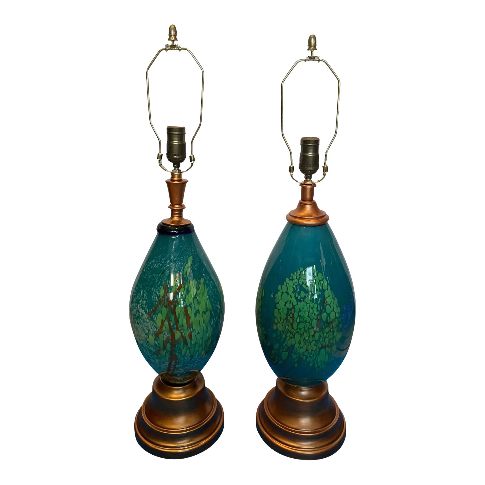 Art Glass Table Lamp a Pair: Abstract Tree: This stunning, one-of-a-kind table lamp set, was meticulously hand blown from exquisite aqua, green, and brown glass by skilled glass artisans. Each lamp is a unique masterpiece, showcasing subtle