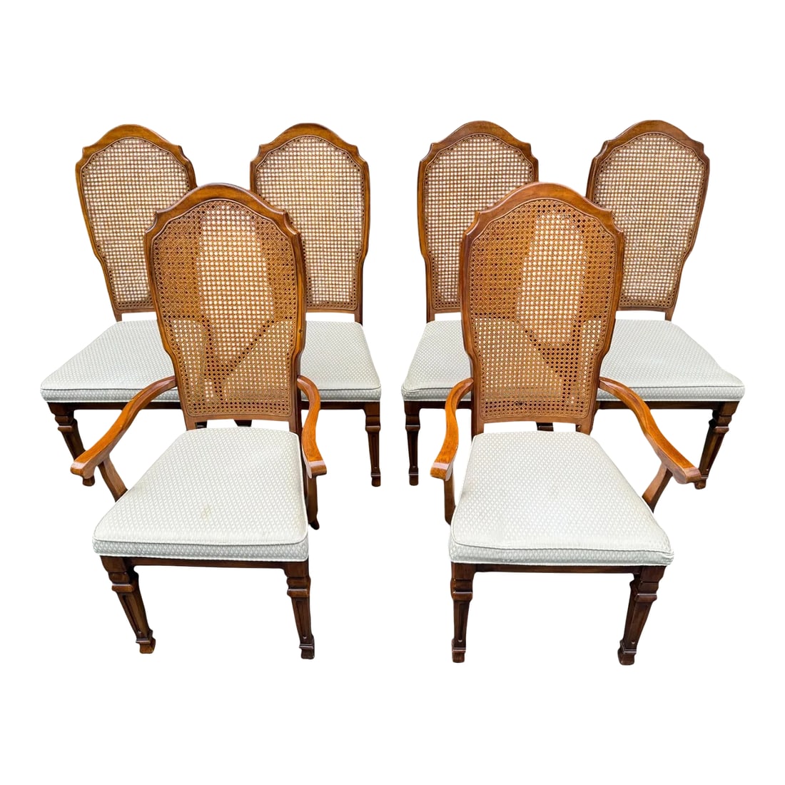 Stanley Cane Dining Chairs - Set of 6: Quick Hits: - Set of 6 Stanley cane dining chairs (4 side chairs and 2 arm chairs) - Traditional design with cane backs - Elegant wood finish with comfortable upholstery - Timeless piece for dining
