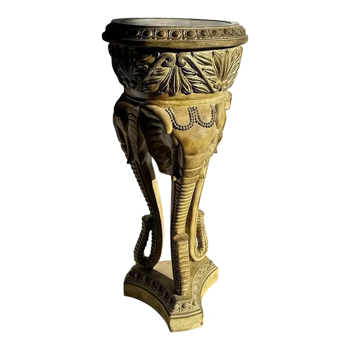 Regency Three Elephant Plant Stand/Planter/Planter: This striking Regency-style planter features a trio of intricately detailed elephant heads supporting a richly adorned pedestal bowl. The ornate carvings of floral motifs and regal patterns evoke time