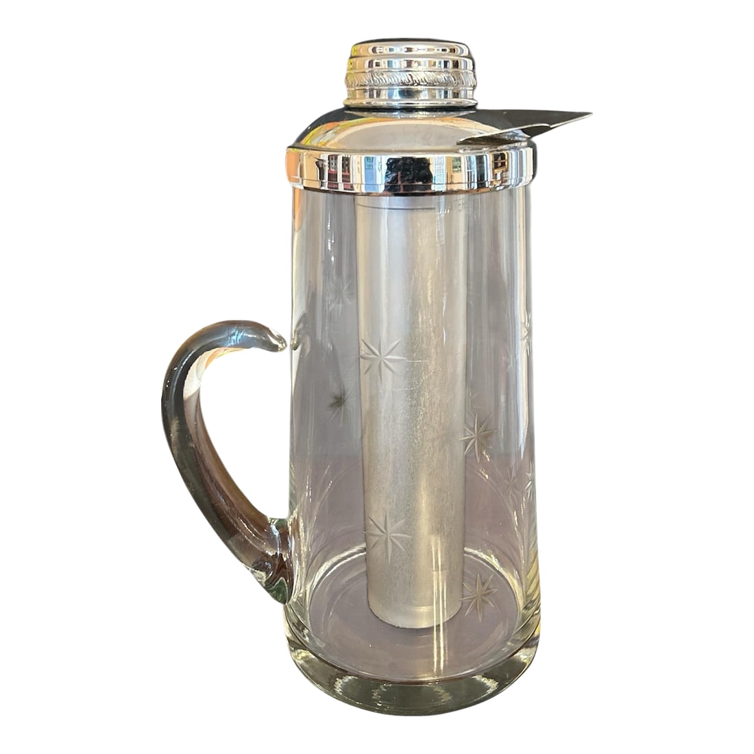 Vintage Ice Water Pitcher: Fabulous rare pitcher. It's etched glass with etched star pattern and the handle is only attached on the bottom, very cool design. The top looks like a bar shaker attached to an aluminum piece meant