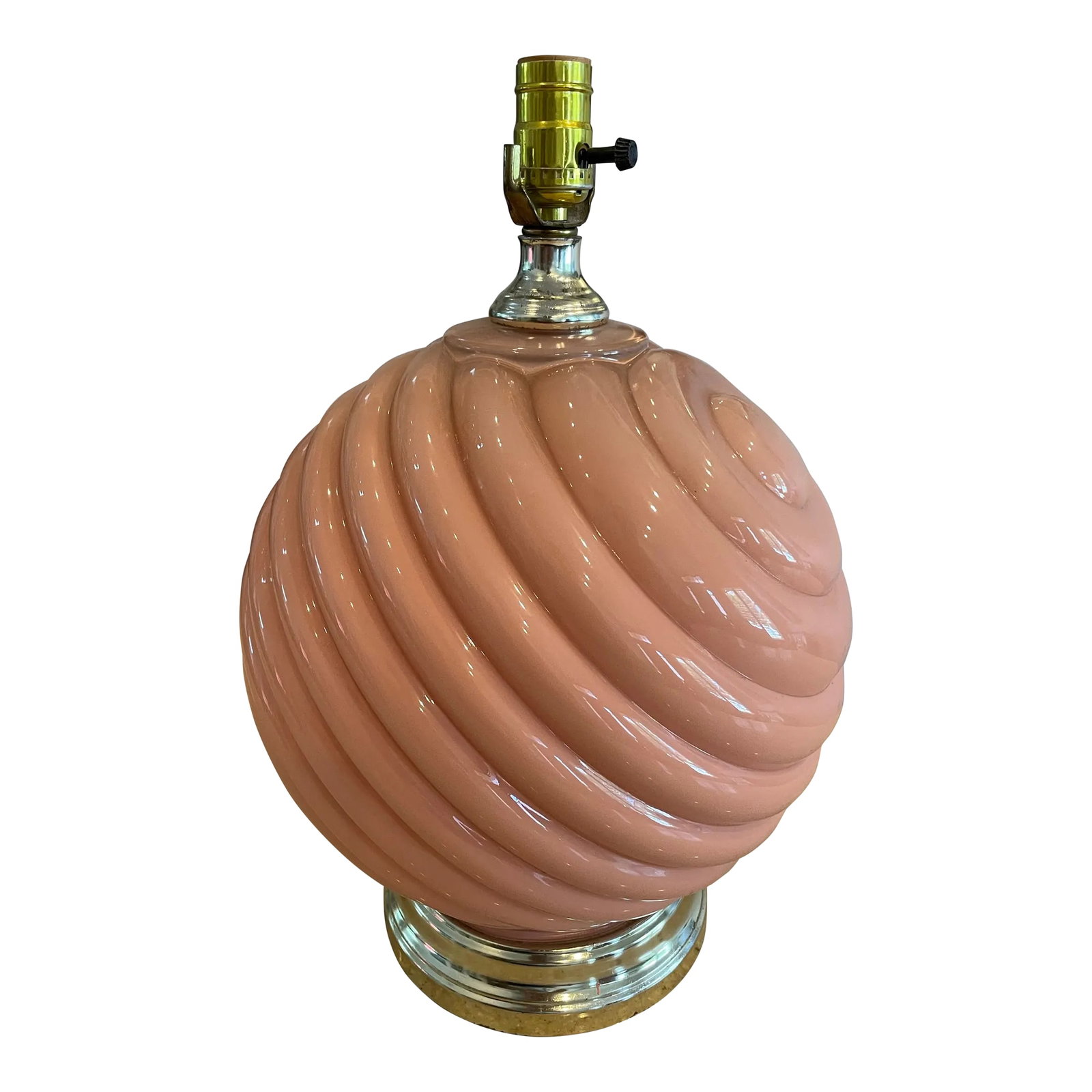 Postmodern Blush Pink Ribbed Glass Lamp With Polished Brass Base: A charming and sculptural postmodern table lamp dating to the late 1980s or early 1990s. This piece features a beautifully molded ribbed glass sphere in a soft blush pink hue, perched atop a polished