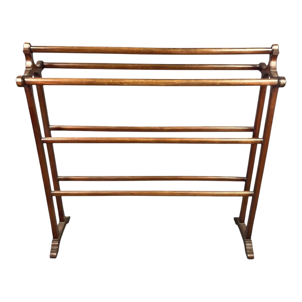 Mid 20th Century Mid Century Blanket or Quilt Rack: Beautiful mahogany quilt or blanket rack. This example has been wonderfully preserved and has multiple racks for blankets or quilts. It could also be used as a magazine or clothing rack. Condition: Al