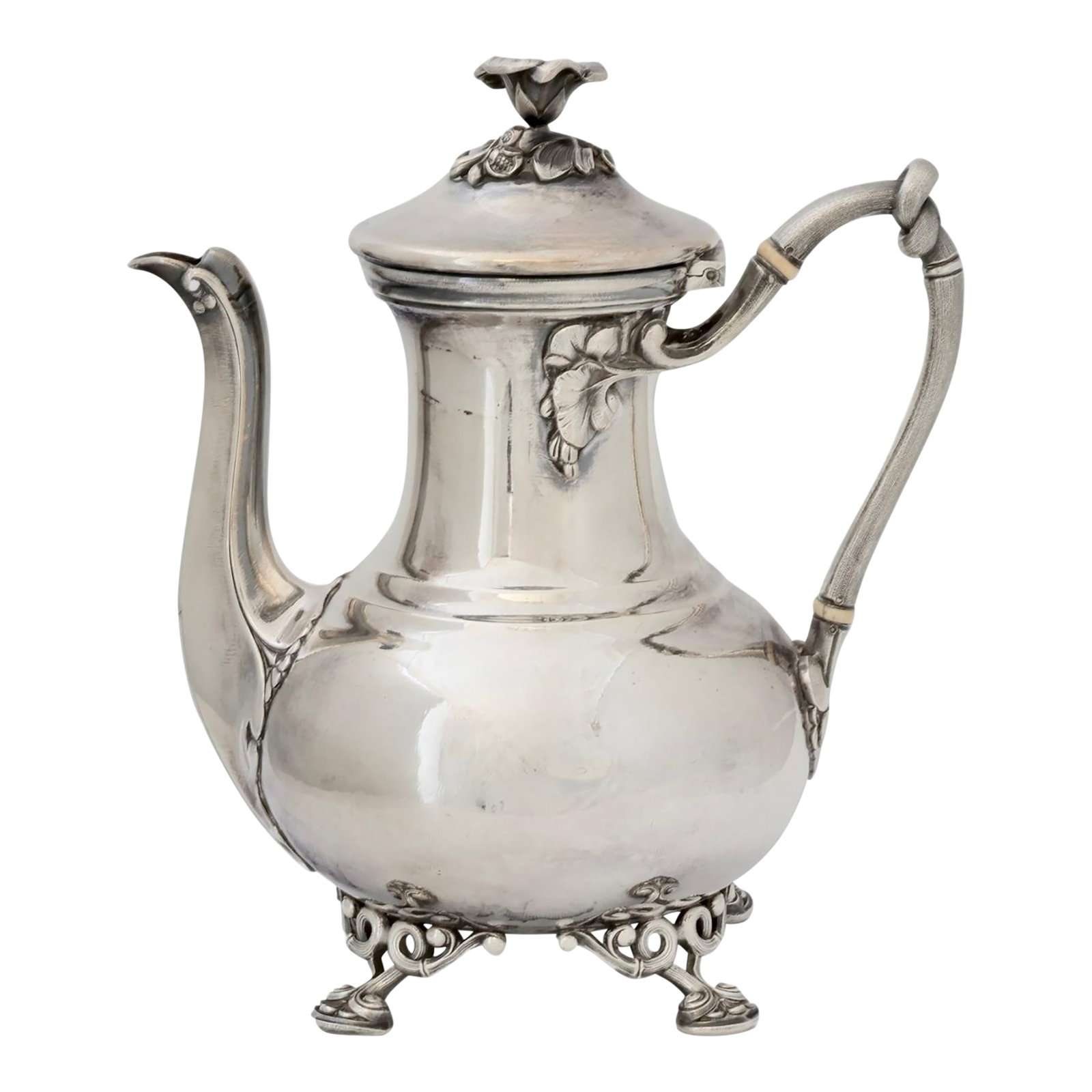 French Christofle Silverplate Coffee Pot: An elegant antique silver-plated coffee pot by Christofle, showcasing ornate Rococo details including a floral finial, scrolled feet, and a gracefully curved handle. Its lustrous finish and sculptural