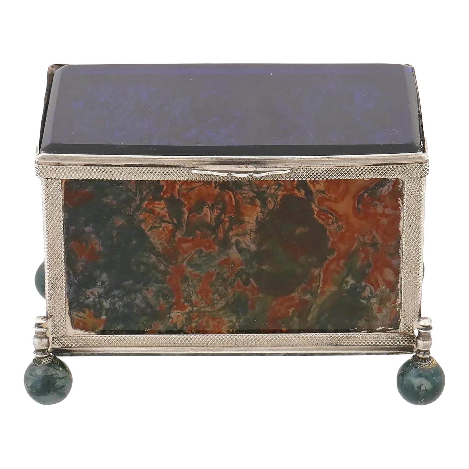 Mid 20th Century Decorative 925 Silver Glass Moss Agate Trinket Box: A decorative glass and moss agate box with a 925 sterling silver frame. Two sides of the box feature panels of moss agate, showcasing a mix of brown, red, and green hues. The lid and other sides is