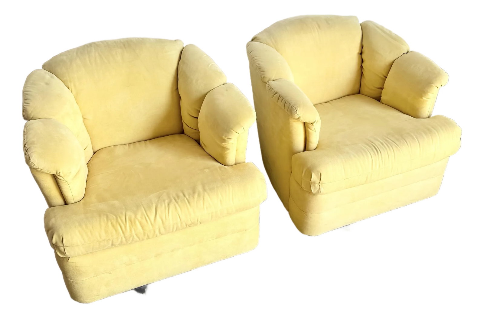 Vintage Postmodern Yellow Fabric Swivel Chairs - Pair: Vibrant pair of vintage postmodern swivel chairs in soft buttery yellow fabric. These plush, oversized lounge chairs feature rounded lines, generously cushioned arms, and a sculptural silhouette