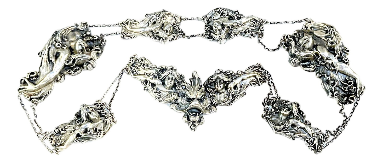 Art Nouveau Sterling Figural 8 Piece Belt by William B. Kerr Silver Company: Art Nouveau Sterling Figural 8 Piece Belt by William B. Kerr Silver Company USA, circa 1890s This Art Nouveau sterling silver belt by the esteemed William B. Kerr Silver Company stands as a true