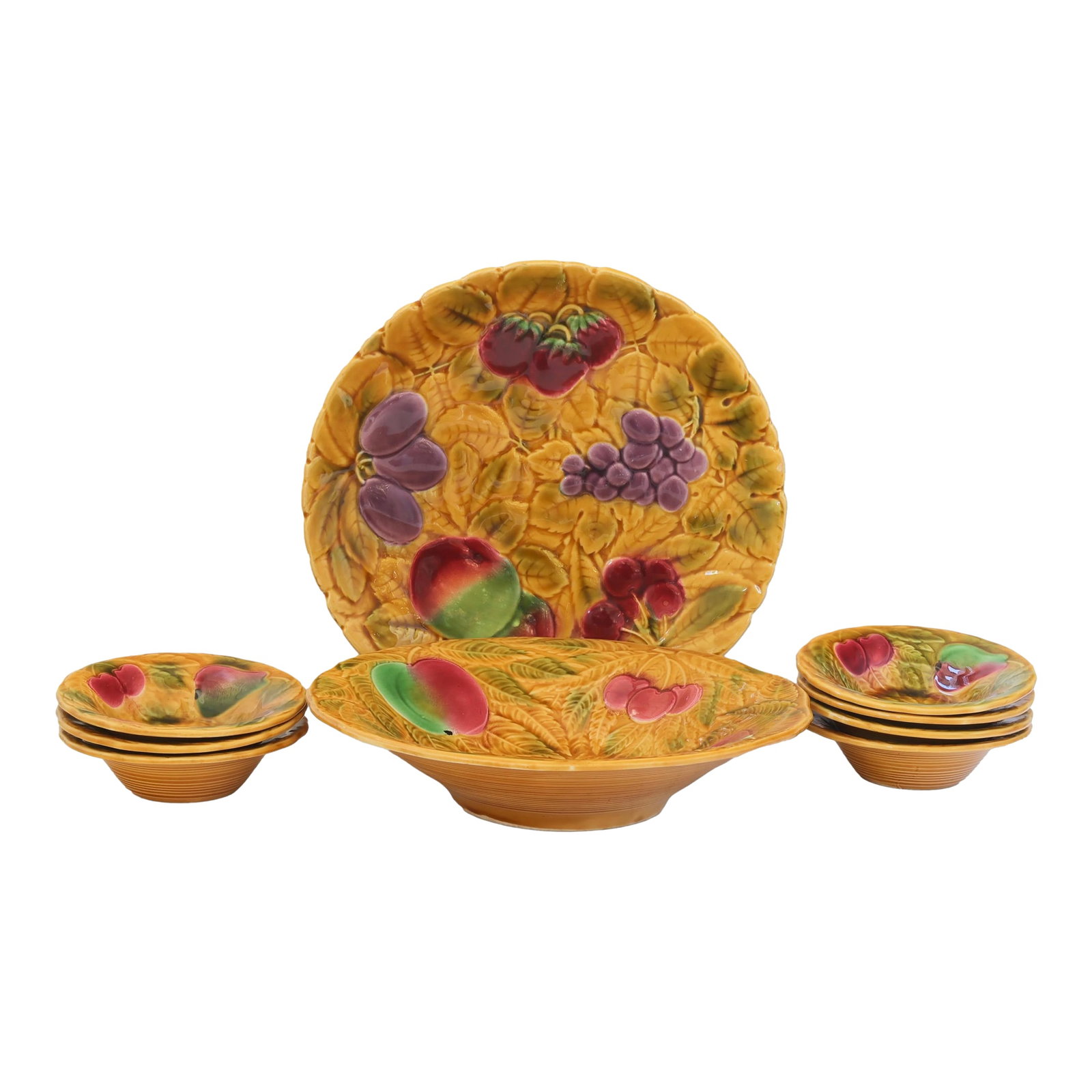 Early 20th-C. French Sarreguemines Majolica Fruit Serving Set: This striking French majolica fruit service by Sarreguemines dates to the early 20th century and is offered as a complete nine-piece set. The collection includes seven individual bowls, one