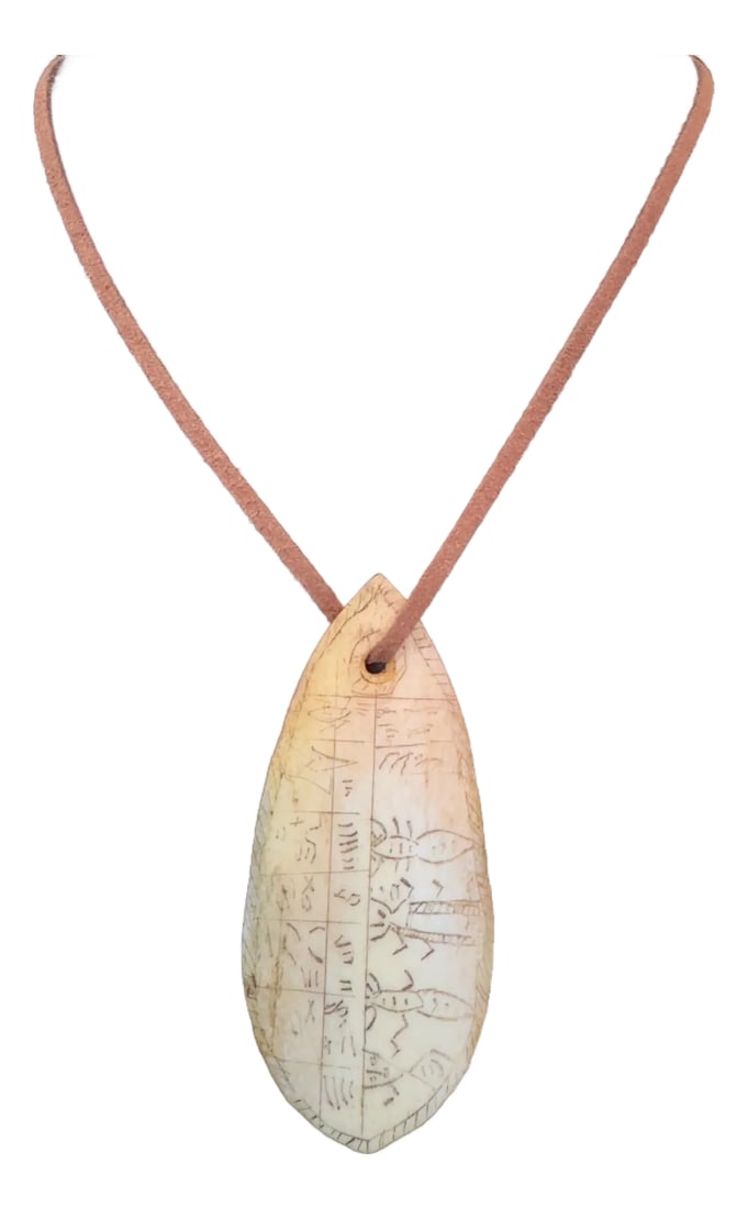 Antique Batak Shaman Calendar Pendant, Porhalaan: Very unique Batak calendar pendant, originating from the Batak people of North Sumatra, Indonesia. These items are traditionally made from bone, often buffalo, and features intricate carvings or scrim