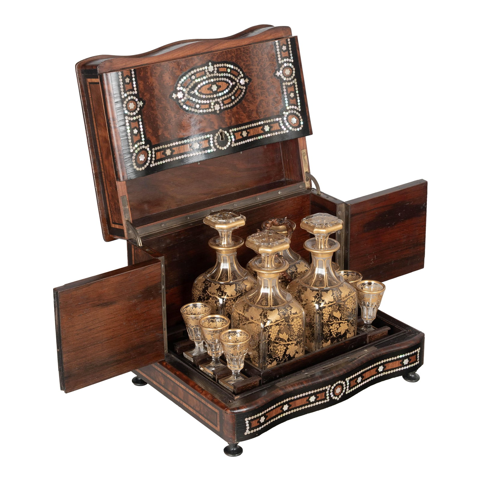 19th Century French Marquetry Tantalus Cordial Decanter Set - Set of 11: A fine 19th century French Napoleon III style tantalus, or cave Ã liqueur, in the style of Charles-Guillaume Diehl. Serpentine form marquetry case is skillfully crafted with