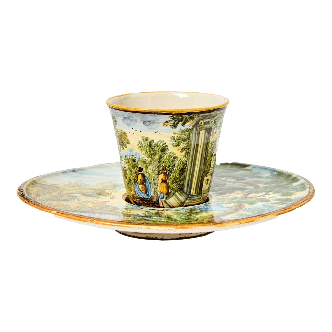 Mid 18th Century Italian Majolica Trembleuse Cup & Saucer, Castelli: Pastoral Landscapes: Rare Castelli Maiolica Trembleuse Cup and Saucer, Mid-18th Century A rare and exquisite Italian Maiolica "Trembleuse" cup and saucer, produced in the famous ceramic center of