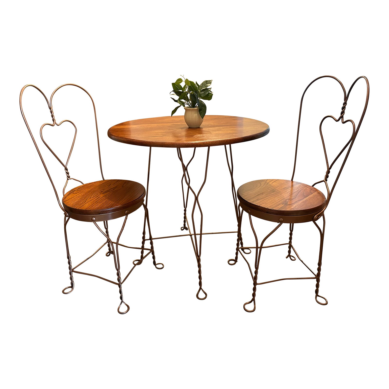 Extremely Rare and Collectable With- Original Stamped Lag Bolts -19th-Century A. H. Andrew's & Co.: .This beautiful Rare ( Late 18th Century- 1908) three piece ice cream parlor suite manufactured by historic A.H. ANDREWS Company of Chicago. The set consists of one bistro table and two matching