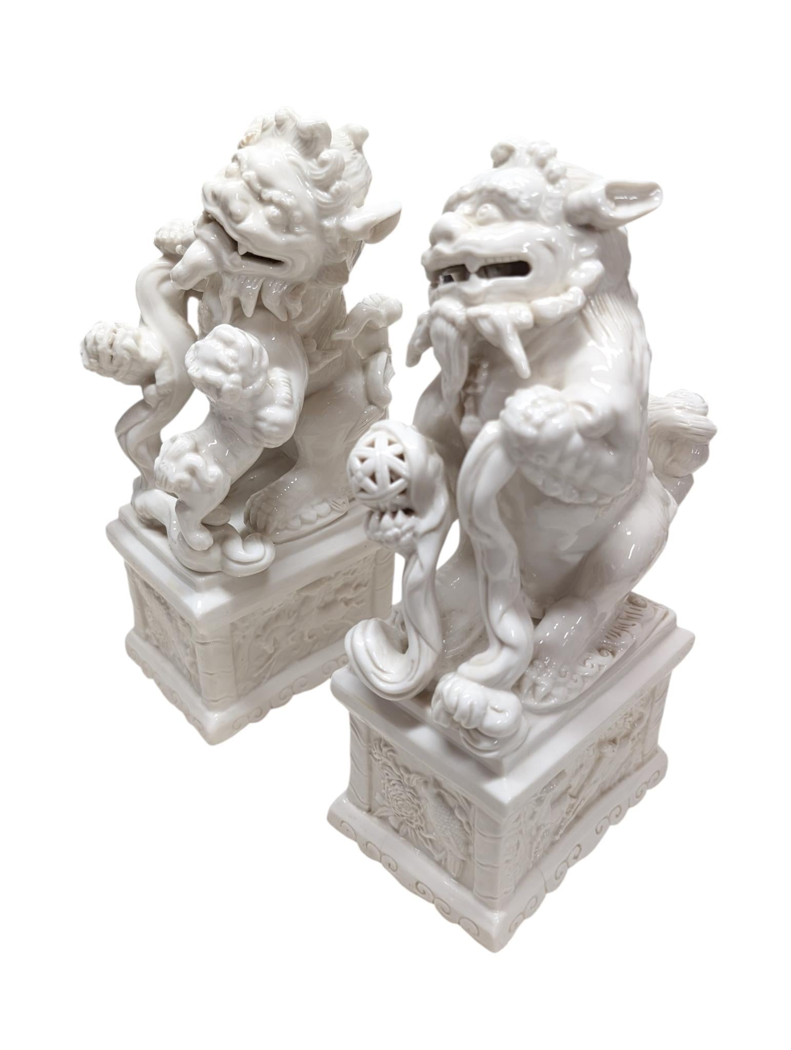 Pair of Vintage Chinese Porcelain Blanc De Chine Foo Dog Statues. - 2