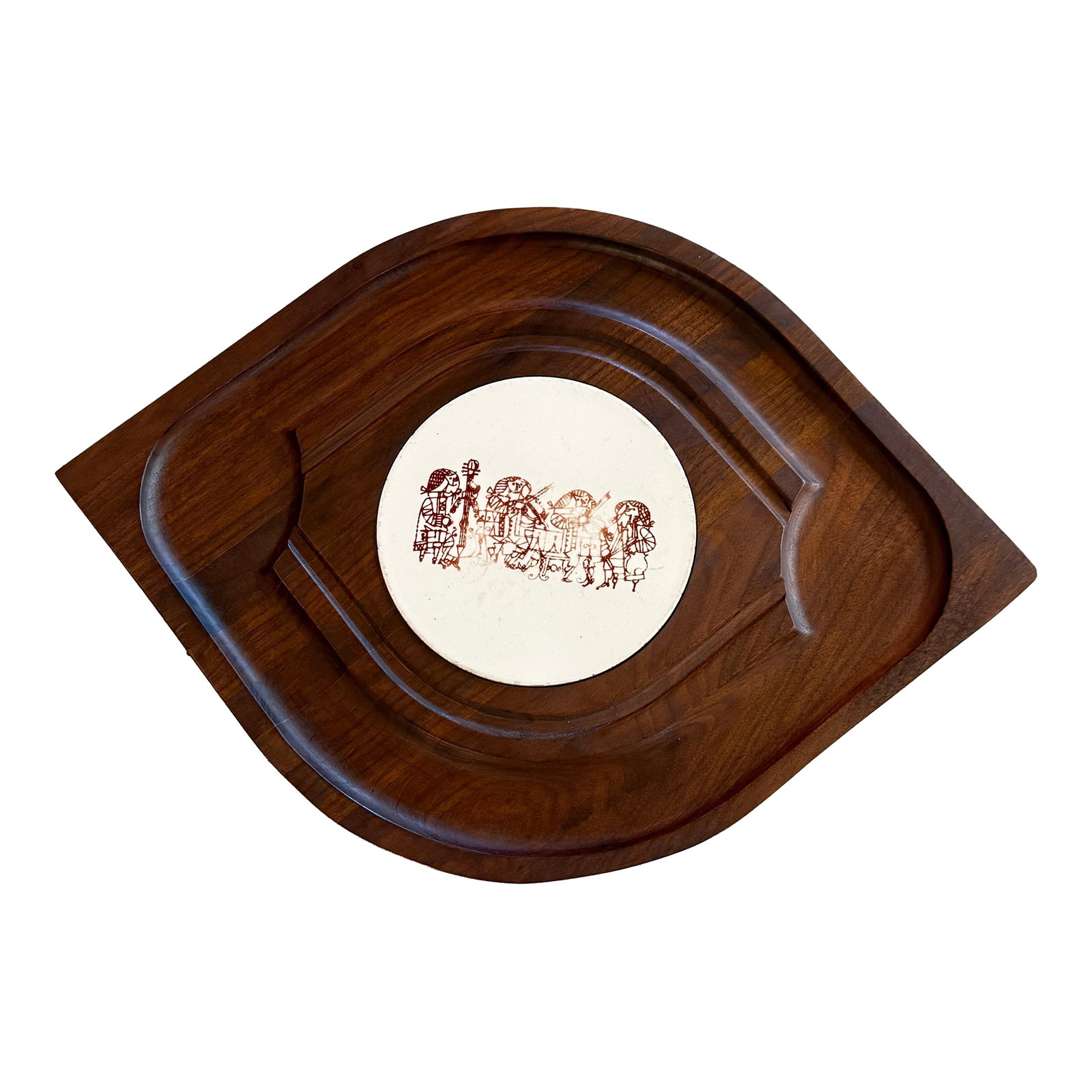 1960s Scandinavian Modern Teak Serving Platter by Bjorn Wiinblad for Nymolle: This distinctive Scandinavian Modern serving platter is by iconic Danish artist BjÃ¸rn Wiinblad for NymÃ¸lle. The platter features a teardrop shaped teak tray with carved ridges