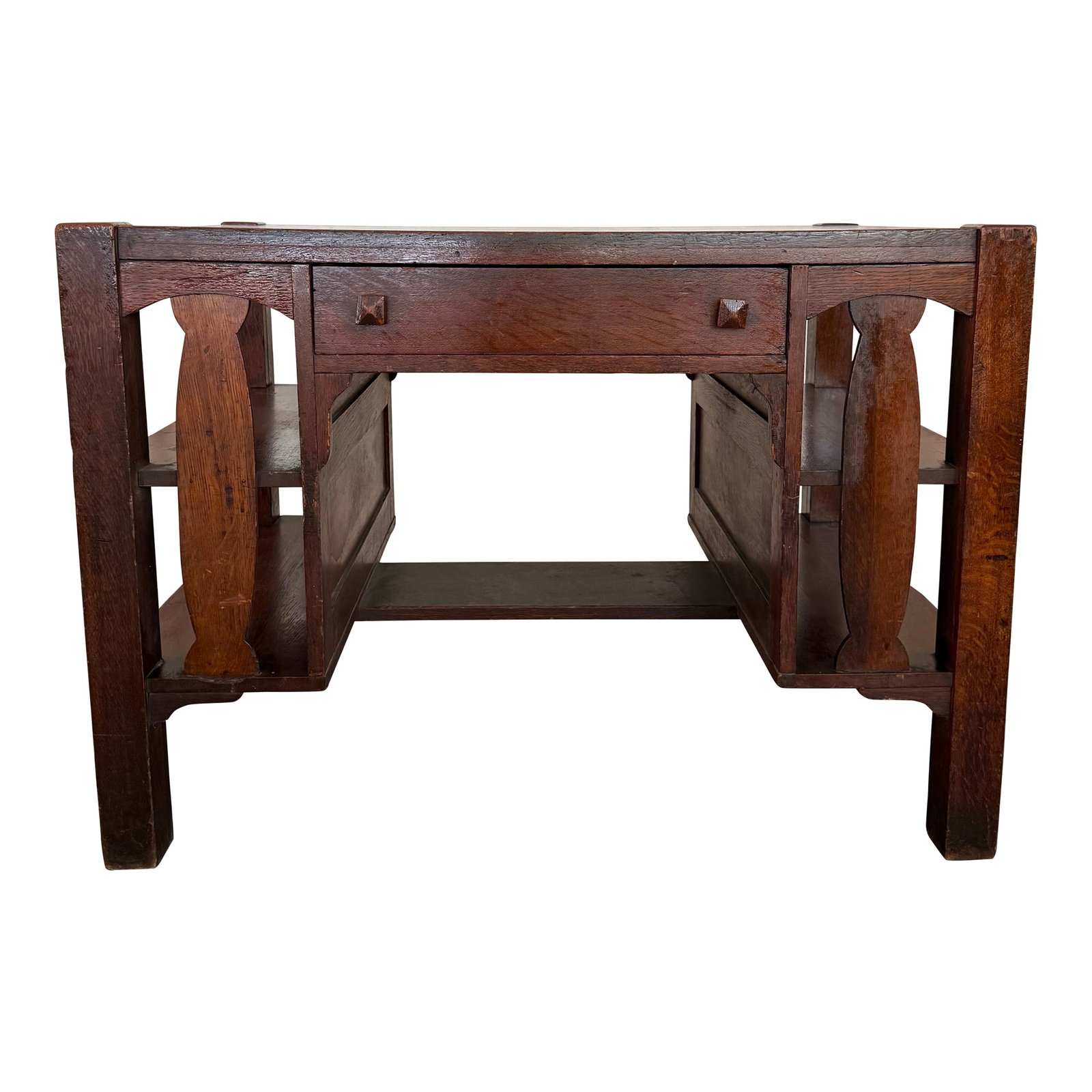 Stickley Brothers Style Arts & Crafts Double-Sided Desk With Bookshelves: This Arts & Crafts desk circa the 1920s beautifully showcases the honest craftsmanship and geometric precision of the Arts & Crafts movement. Constructed from solid oak, its highly functional