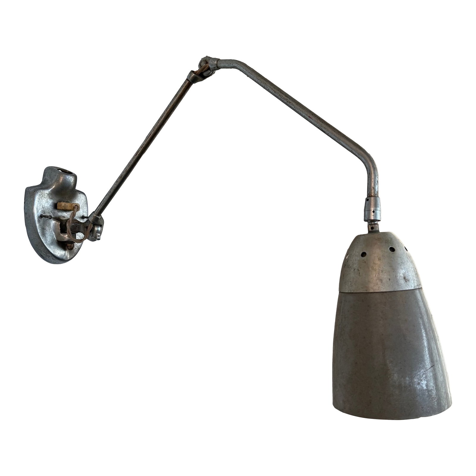 1950s Industrial Mid-Century Articulating Task Lamp Wall Sconce: This industrial, mid-century, articulating task lamp circa the 1950s features a rugged, adjustable steel extension arm paired with a classic cone-shaped fiberglass bullet shade. The task lamp adjusts