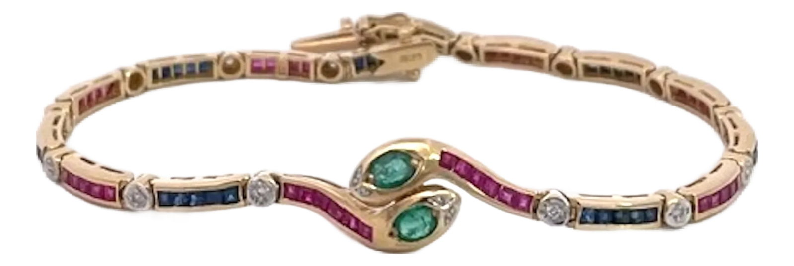 Vintage Yellow Gold Snake Bracelet With Emeralds, Rubies, and Diamonds: This is a stunning gold gemstone bracelet featuring a distinctive "toi et moi" (you and me) snake-inspired design at its centerpiece, where two curved gold bands meet, each set with an oval-cut