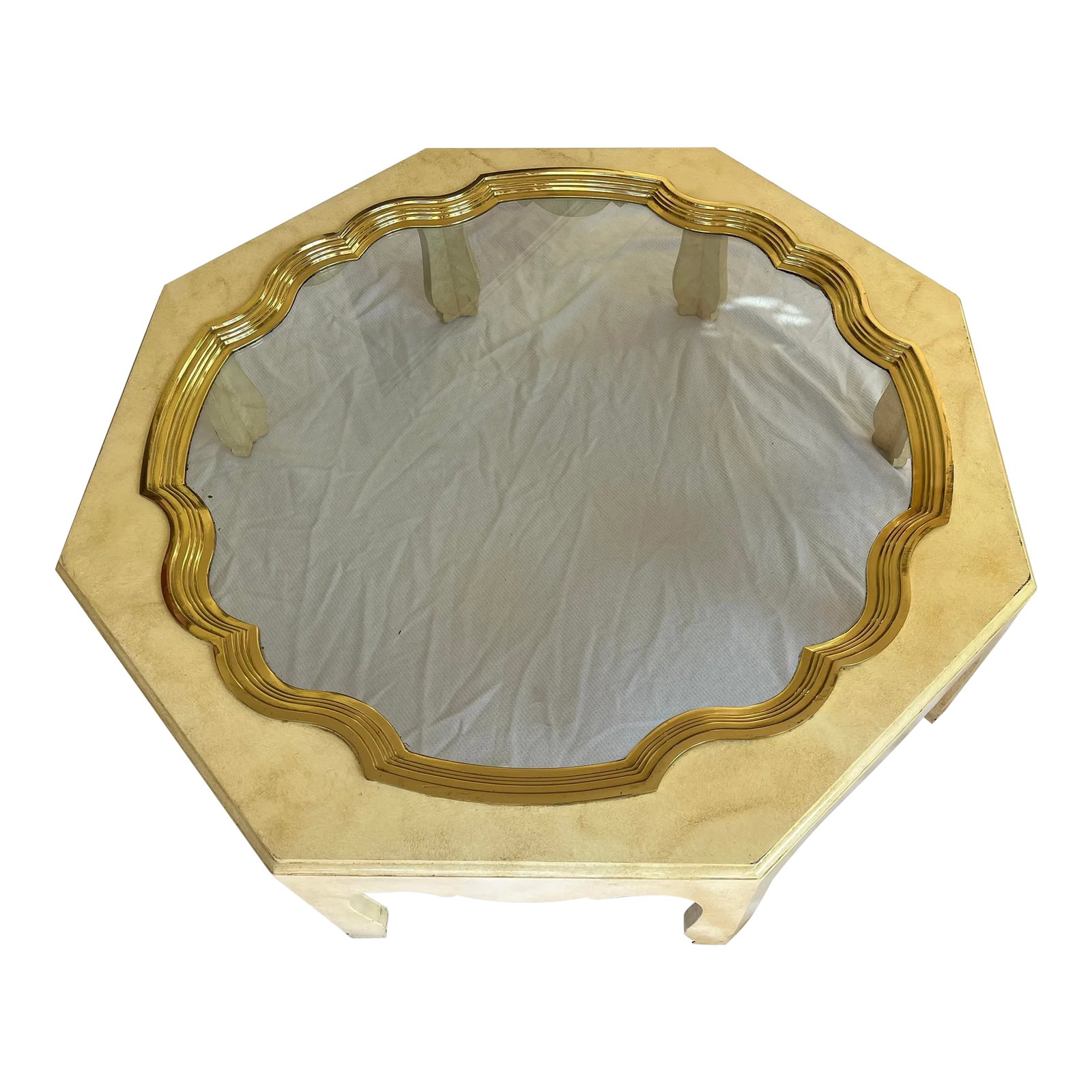 Mid 20th Century Vintage Baker Collection Octagonal Coffee Table: Large Baker cream octagonal coffee table. Scalloped brass edges with glass tray top, hexagonal frame, hand-painted details, quality American craftsmanship, great style and form, circa mid-late 20th