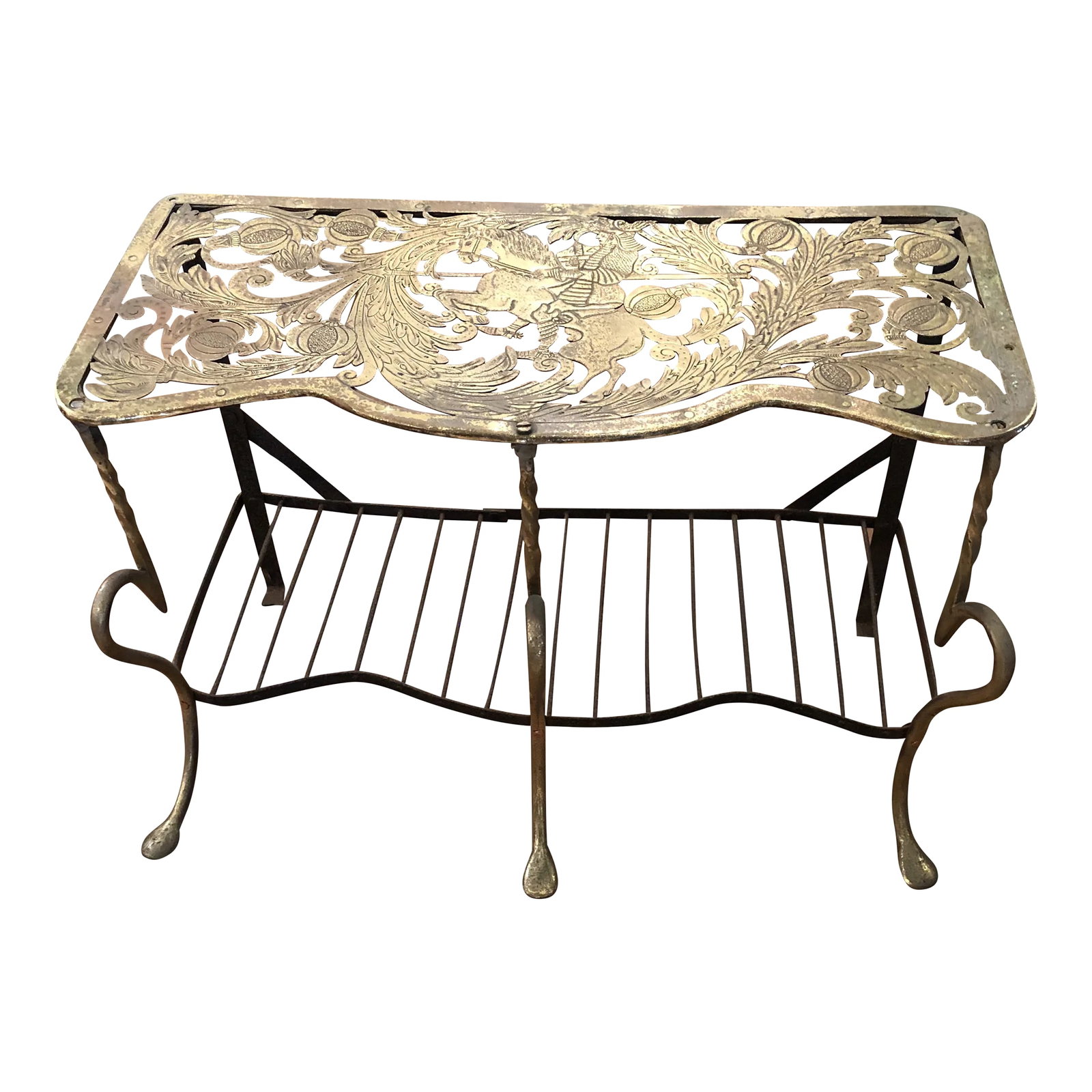 Antique 19th Century Engraved and Intricately Cut Brass Trivet: Beautiful 19th century elaborately cut and engraved brass trivet having a horse and rider centrally depicted on top, a lower shelf 4" from floor, scalloped front edge and lovely cabriole twisted iron