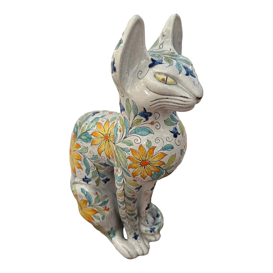 Egyptian Inspired Sgraffito Glazed Terracotta Cat With Floral Decoration: Large striking Italian Egyptian inspired terracotta statue of a beautifully glazed and decorated cat with floral designs with green, turquoise, yellow and orange against a white background. It dates