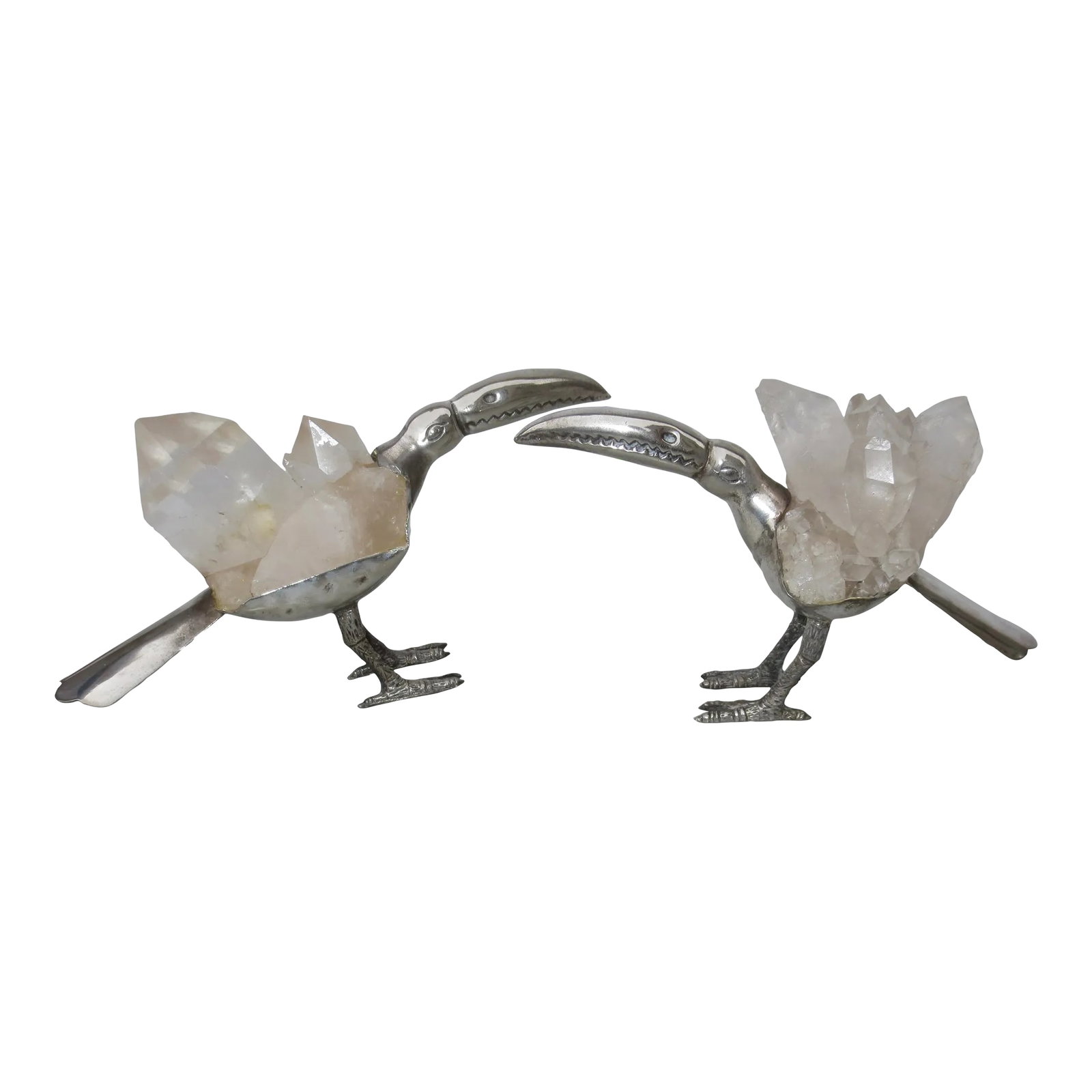 Gerson Brazilian Rock Crystal and Silvered Brass Toucans -A Pair of 2: Brazilian silvered sculptures of toucans with specimen clusters of good rock crystal. Balanced to stand with large groups of crystals on their backs and set as a pair. Hallmarked Gerson to the bottom