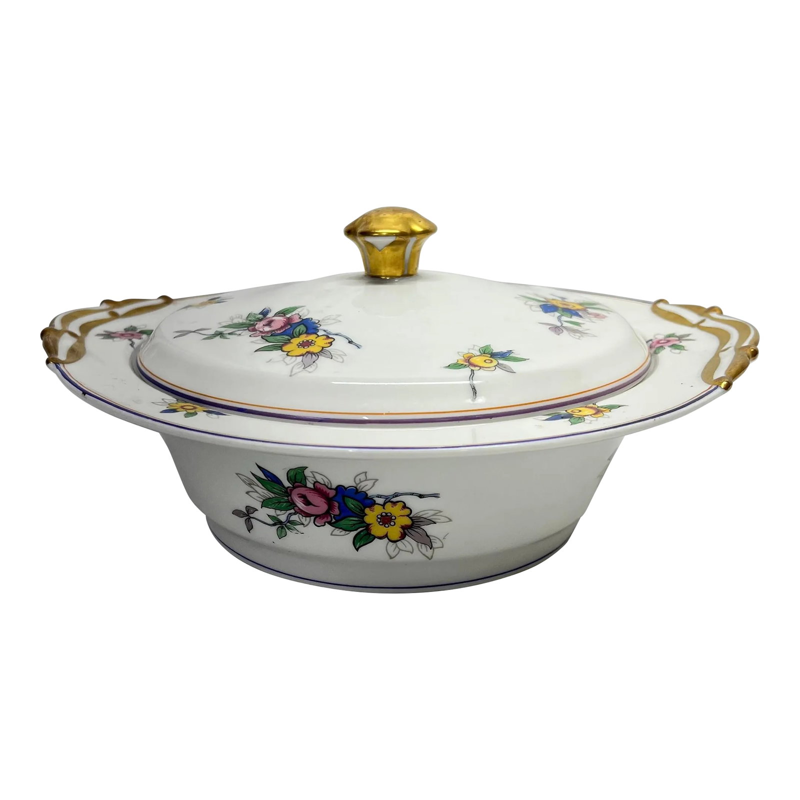 Limoges France Covered Serving Bowl: Limoges France covered serving bowl decorated with flowers in yellow, pink, blue and green. Adorned with gilt handles. Measures 10" w x 9.5" d x 5" h, without lid 2.75" h. Very minor wear. See mark
