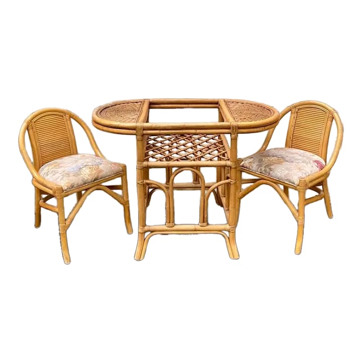 1970s Vintage Mid Century Bamboo Bistro Table Set - 3 Pieces: The vintage bistro set includes a charming table and a pair of chairs, all designed with the retro flair of that era. With unique patterns and vibrant colors, it's a perfect addition to any garden,