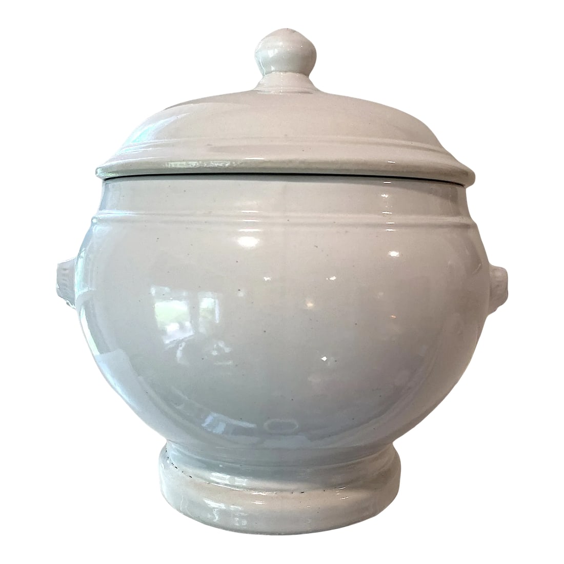 Antique French White Ironstone Tureen Lion Face Handles and Lid: Substantial antique French ironstone soup tureen with molded lion face handles and original lid. Clean and ready to use for meals or for arranging flowers/ potting orchids. A French classic for