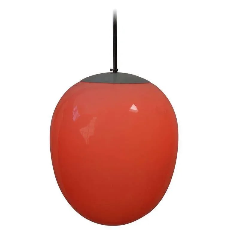 Modern Egg Pendant Light: There's nothing sweeter than the simplicity of this egg form pendant! Seller says: "Being the lover of color that I am I added an orange bulb to the mix. But if you prefer it quieter have a look at