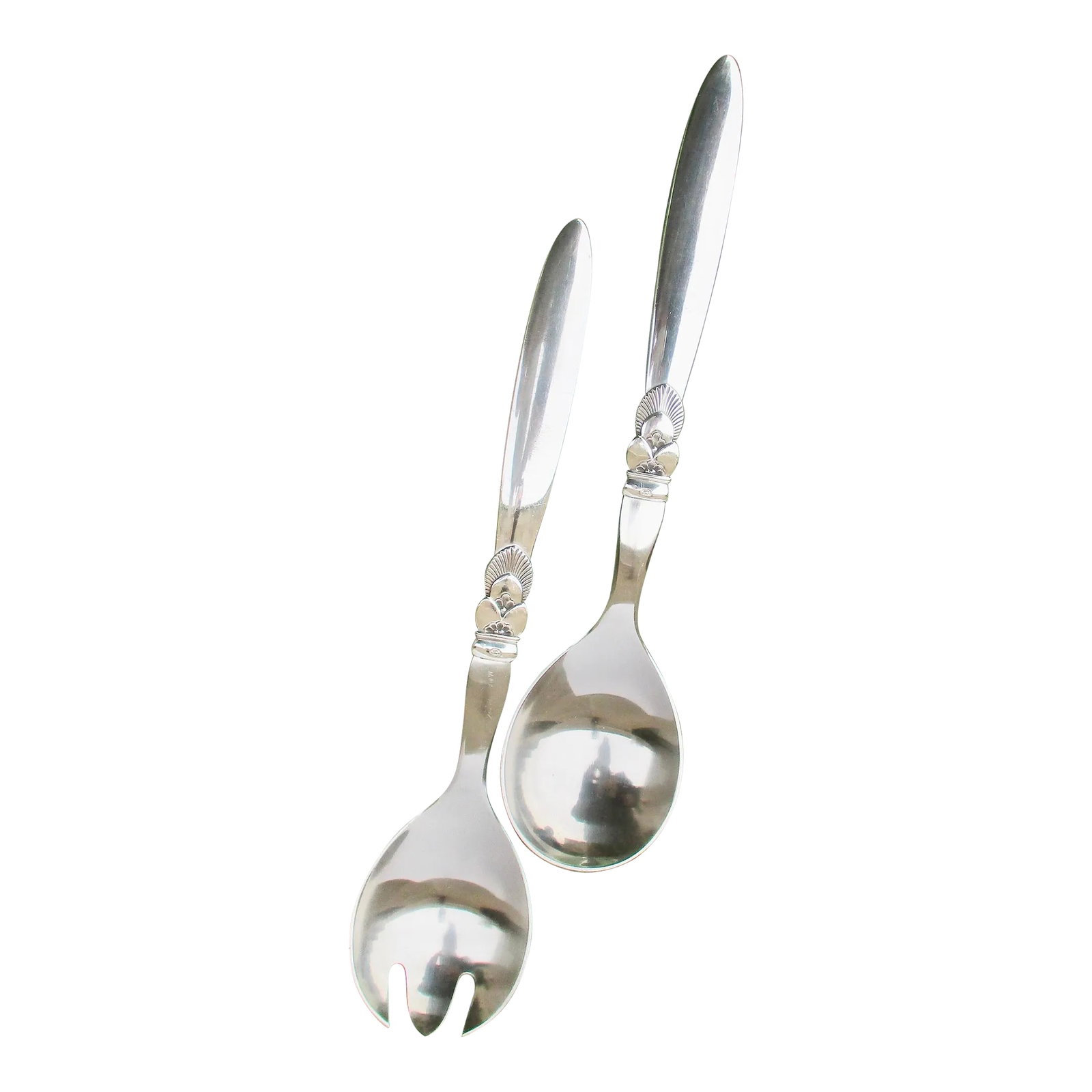 Georg Jensen Cactus Serving Set Circa 1950s. - Set of 2: Cactus pattern circa 50s, designed by Georg Jensen. Large size set with stainless bowls and sterling silver handles. The size is 9.5" long and 2" wide. Beautifully designed pattern with a green pouch 