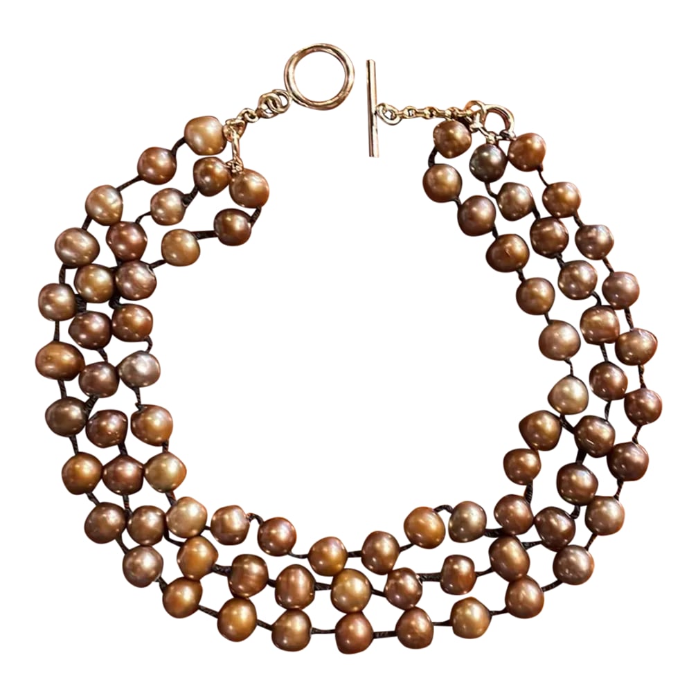 Triple Strand Bronze Pearl Choker Necklace With 14k Clasp: This is a stunning triple strand of bronze pearls. They look incredibly elegant when worn with the right ensemble. Condition: Alterations: Original Condition Unaltered Imperfections: Some