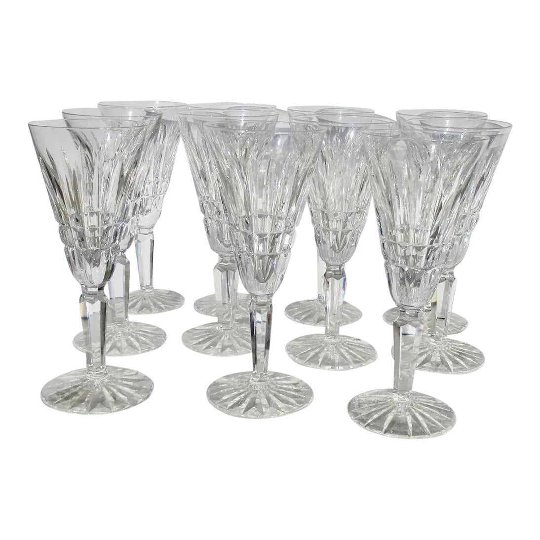 Waterford Glenmore Champagne Flutes Set of 11: Glenmore Crystal flute by Waterford. Vintage Waterford flutes with faceted stems, hallmarked to the foot Waterford. Classic pattern in cut crystal measuring 7" tall and 2.8" in diameter. Very good