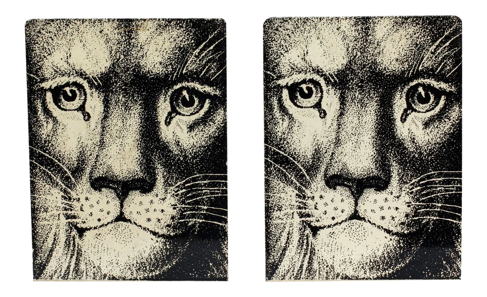 Fornasetti Enamel Lion Face Bookends - a Pair: Fornasetti Bookends signed in gold letters on red felt base. size 8" tall 5 3/4" wide foot 5 1/4" deep. Very collectable. Condition: Alterations: Original Condition Unaltered Imperfections: Some