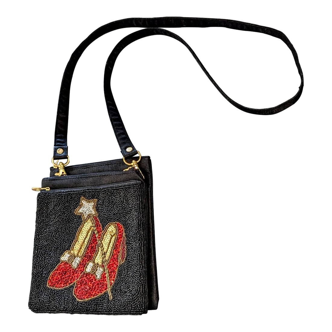 60's Evening Bag Ruby Red Slippers Black Framed Design in Glass Beads: Beaded black satin bag with 3 compartments. The age is a guesstimate. The age range is from the 1940's to the 1980's. The lining has no wear at all. Condition: Alterations: Original Condition