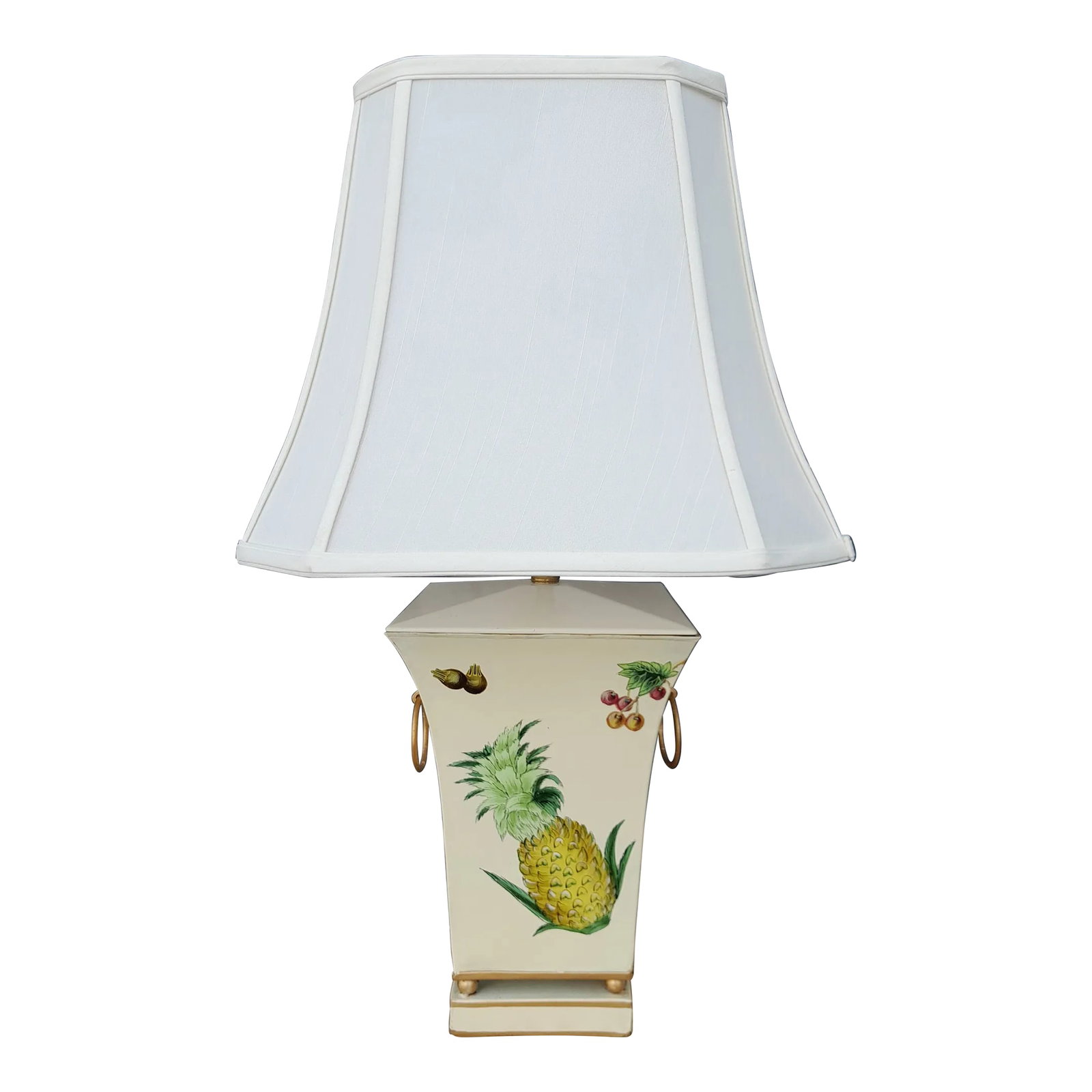 1990s Scully & Scully Style French Country Pineapple and Floral Table Lamp With Silk Shade: The pineapple is a universal symbol saying welcome! This lamp is adorned with the Delicious Fruit as well as an assortment of Florals for a beautiful statement piece. The shade is in white silk. To