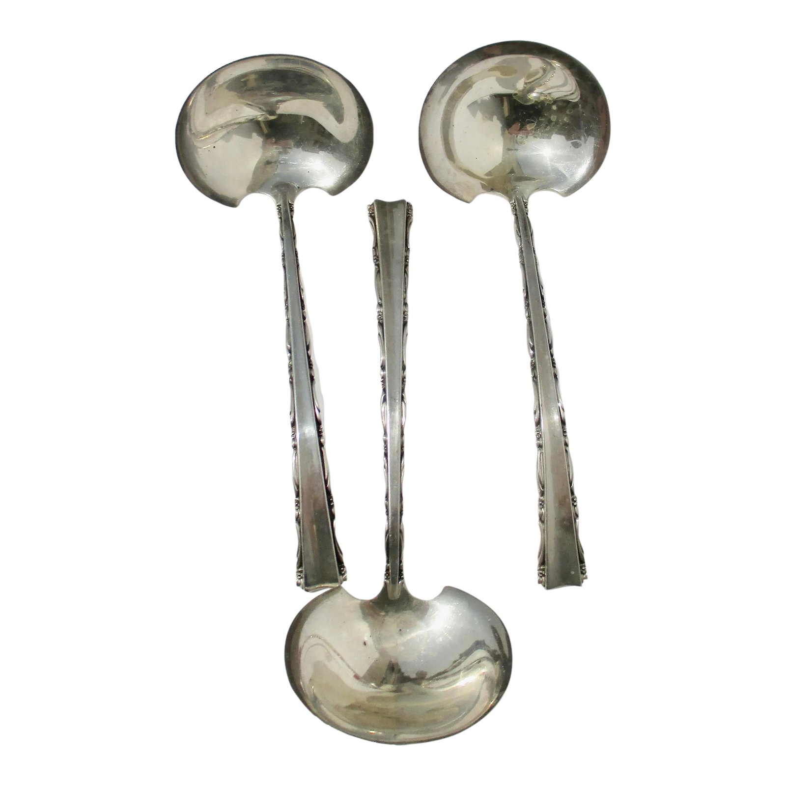 Mandrigal Pattern Sterling Silver Saddles -Set of 3: Sterling Silver Ladles by Lunt. Madrigal pattern with smart modern design.Sculpted handle with a slightly curved handle. The size is 6.5" long by 3" wide. The weight is 6 ounces total. Marked Lunt