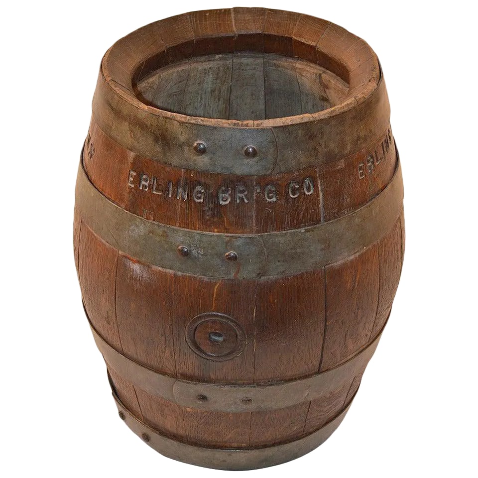 Ebling Brewing Co., Brooklyn, New York, Oak Beer Barrel: Decorative oak beer barrel, held together by iron hoop straps. markers mark carved into the side, and bottom "Ebling Br'g Co. Brooklyn NY 1934" The Ebling brewing company was, to the best of my