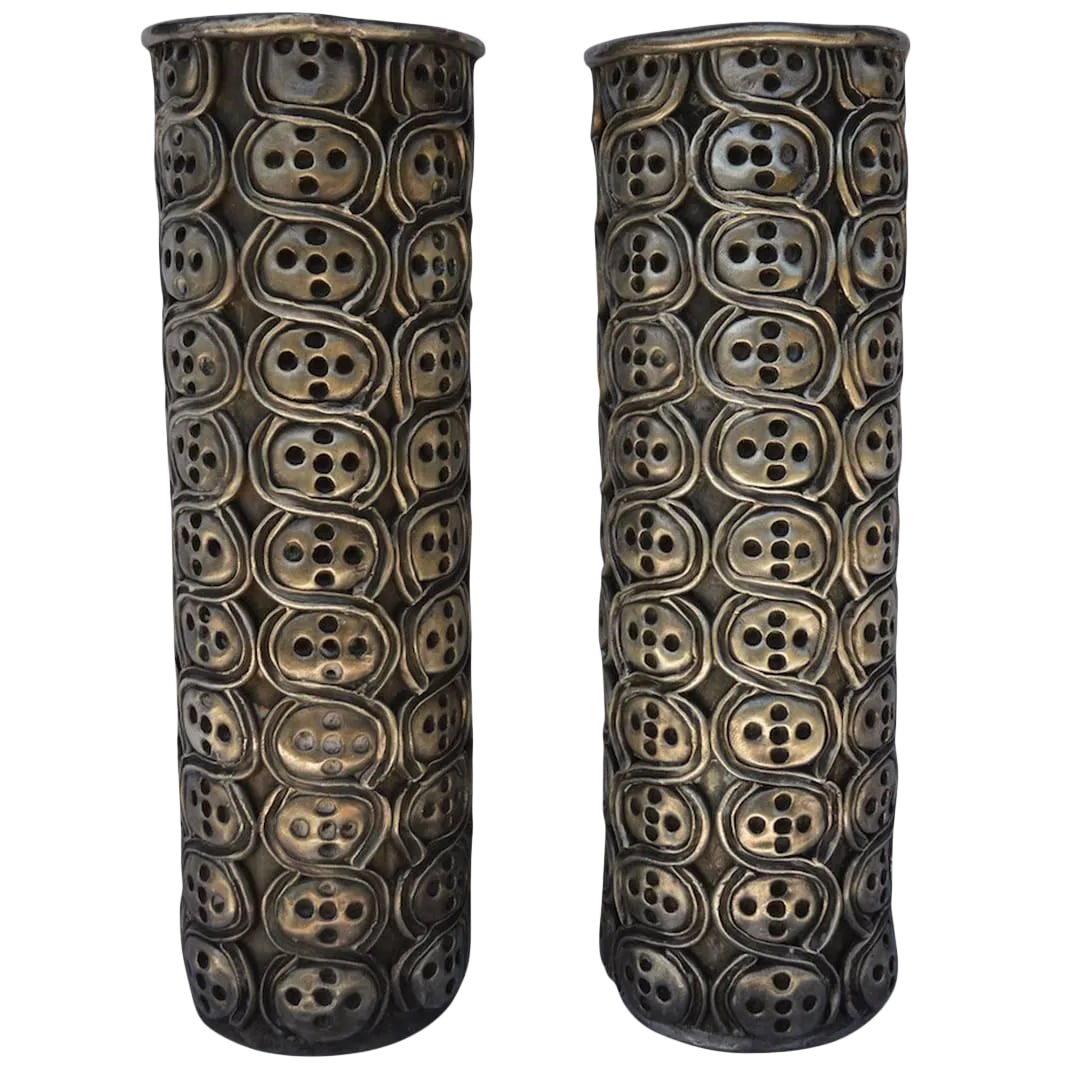 Antonio Pineda Silver Candlesticks - a Pair: Pair of modernist design candlesticks by master silversmith Antonio Pineda. One candlestick is marked". 999 silver not solid Pineda Taxco S.A. de C.V." The metal is silver over a base metal, probably