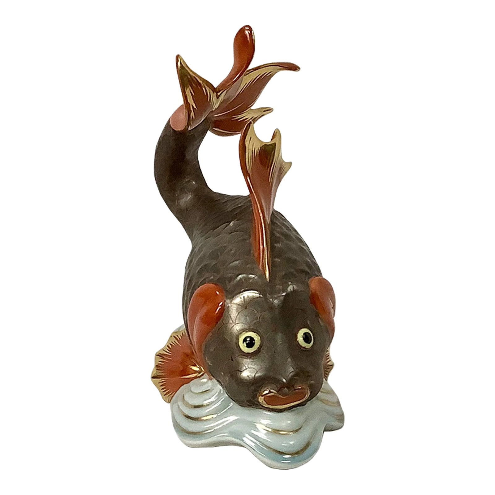 Vintage Hand-Painted Porcelain Herend Koi Fish: Vintage Herend Tropical Koi Fish porcelain figurine. Figurine features iridescent bronze finish with burnt orange fins and bulbous eyes, gold trim. Figurine rests on light blue waves. Makers mark