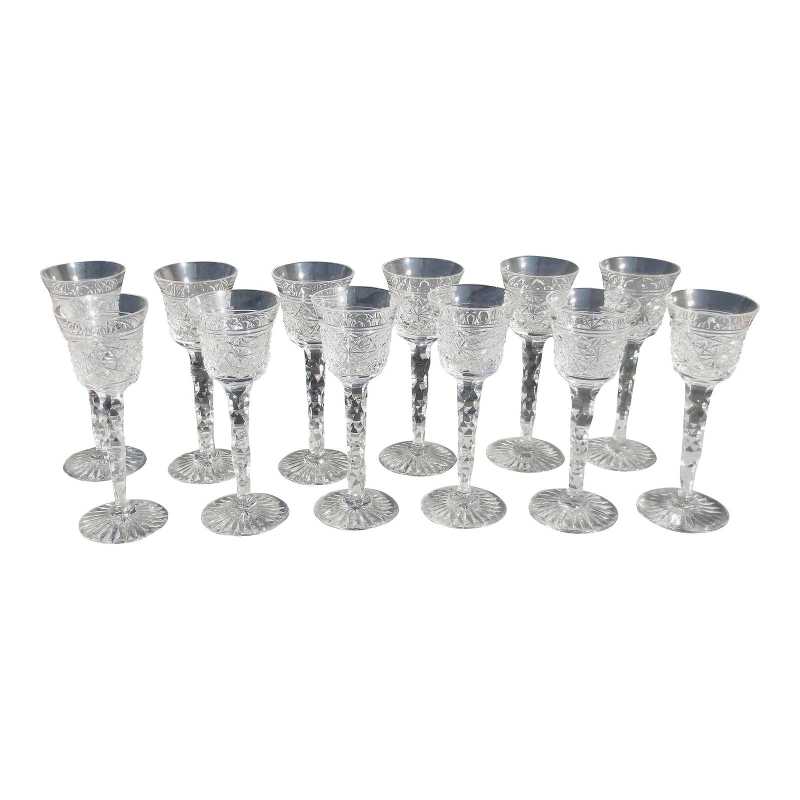 12 Cordials by Royal Leedam Romance - Set of 12: Romance by Royal Leerdam Netherlands. circa 70s' A set of 12 excellent cordials. Honeycomb cut stem pattern, a revival of an 18th-century pattern. A geometric cut with a star base. Excellent