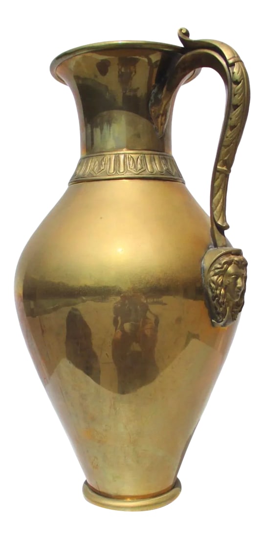 Grand Tour Bronze Handled Olpe Vessel: Roman Grand Tour brass Olpe vessel with heavy bronze handle rising from face-mounted to vase shoulder. Handle in classical fine bronze foliage pattern. The neck is collared by a heavy bronze band of