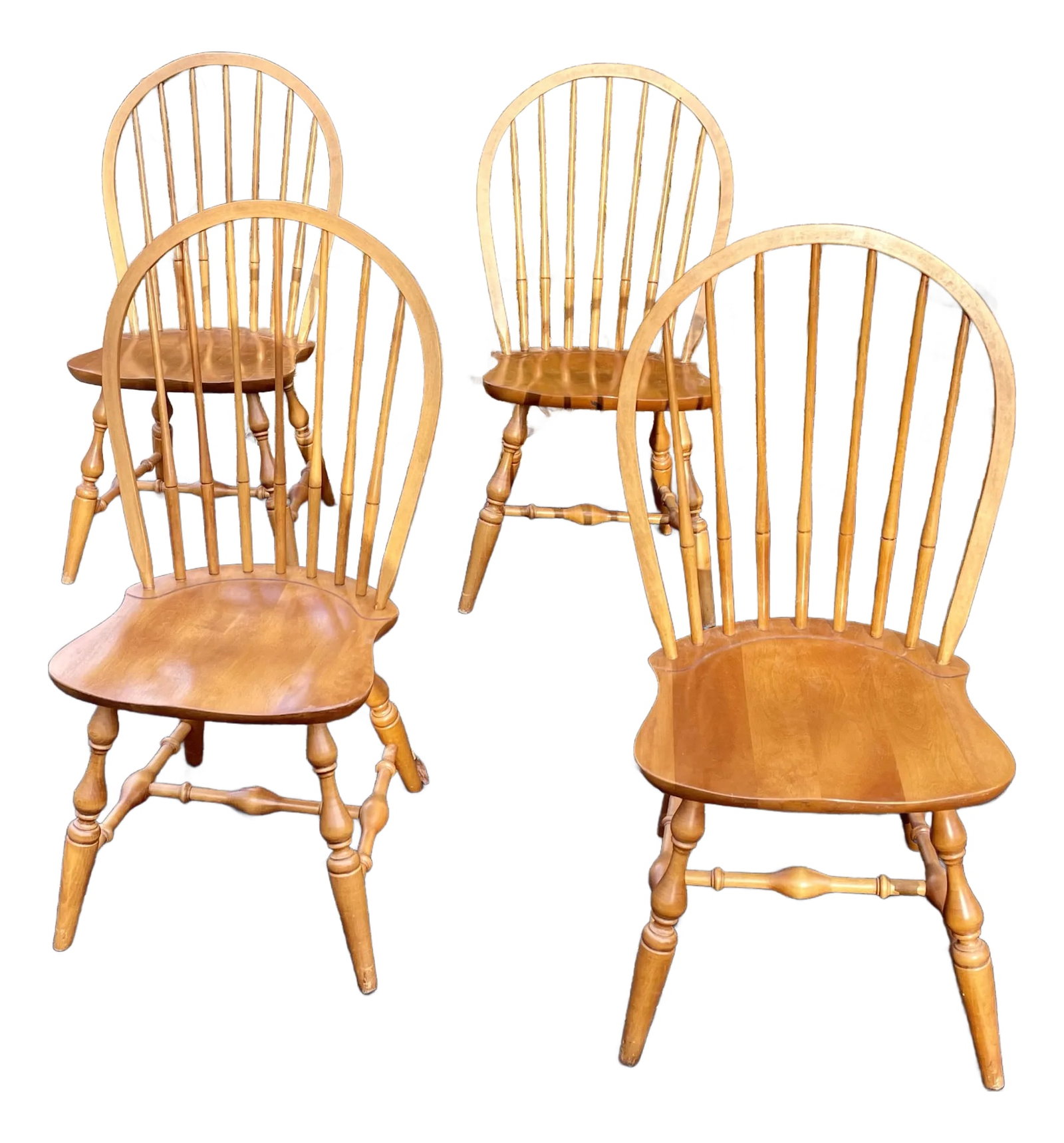 1990s Nichols & Stone Hoop Back Windsor Style Side Chairs- Set of 4: Offered is a set of four bow back Windsor style chairs in oak and maple by Nicols and Stone of Gardner Massachusetts. The bow backs are supported by spindles conjoined to a comfortable shaped seat. Th