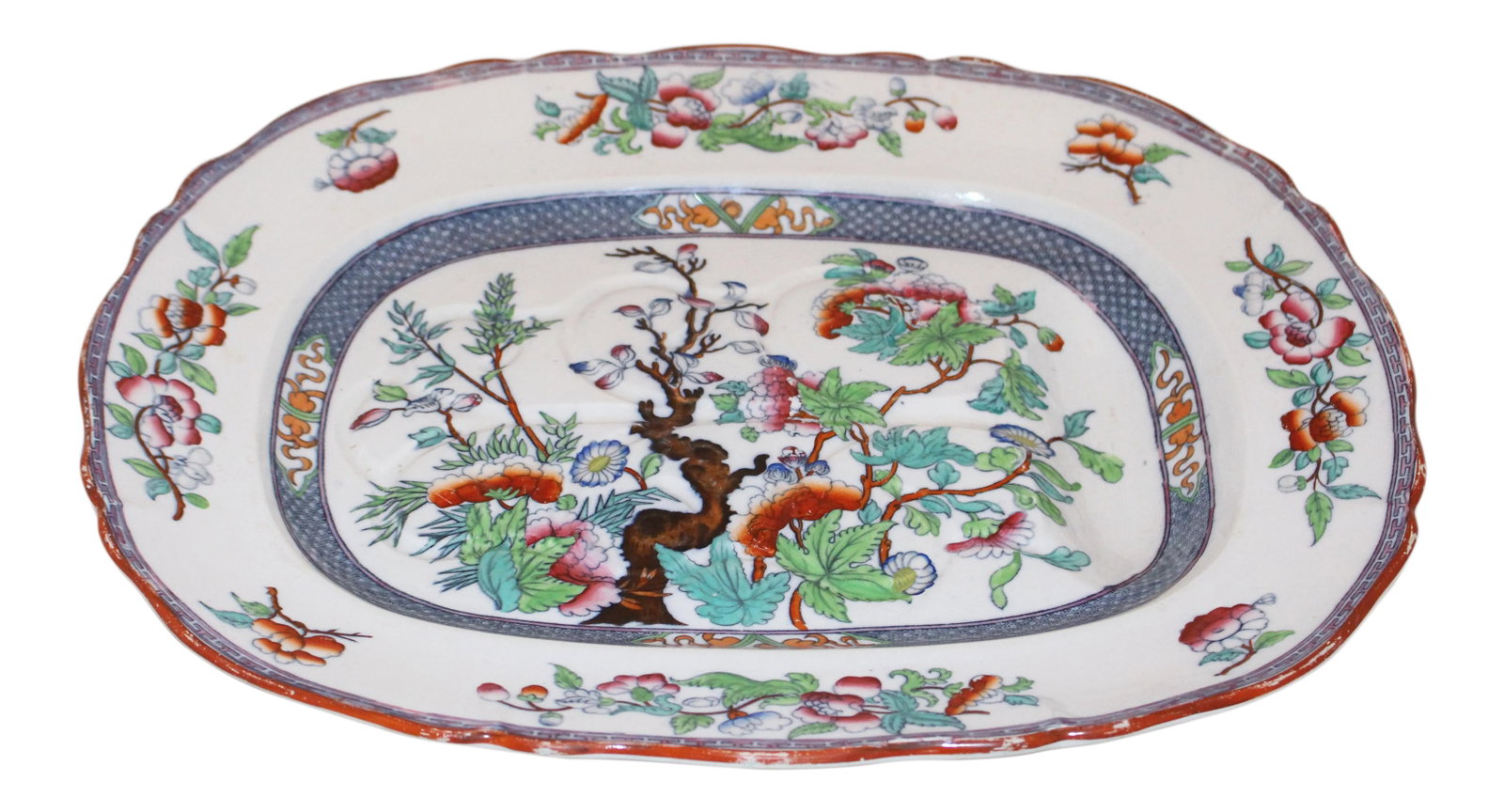Mid 19th Century English Staffordshire Minton Pattern Platter: Minton patter Well & Tree of Life platter, English, Staffordshire, marked "New Stone" & BB (Best Body), date mark 1858. Chip on one supporter. 19 5/8" x 15 5/8" x 2 5/8" h. Condition: Alterations: