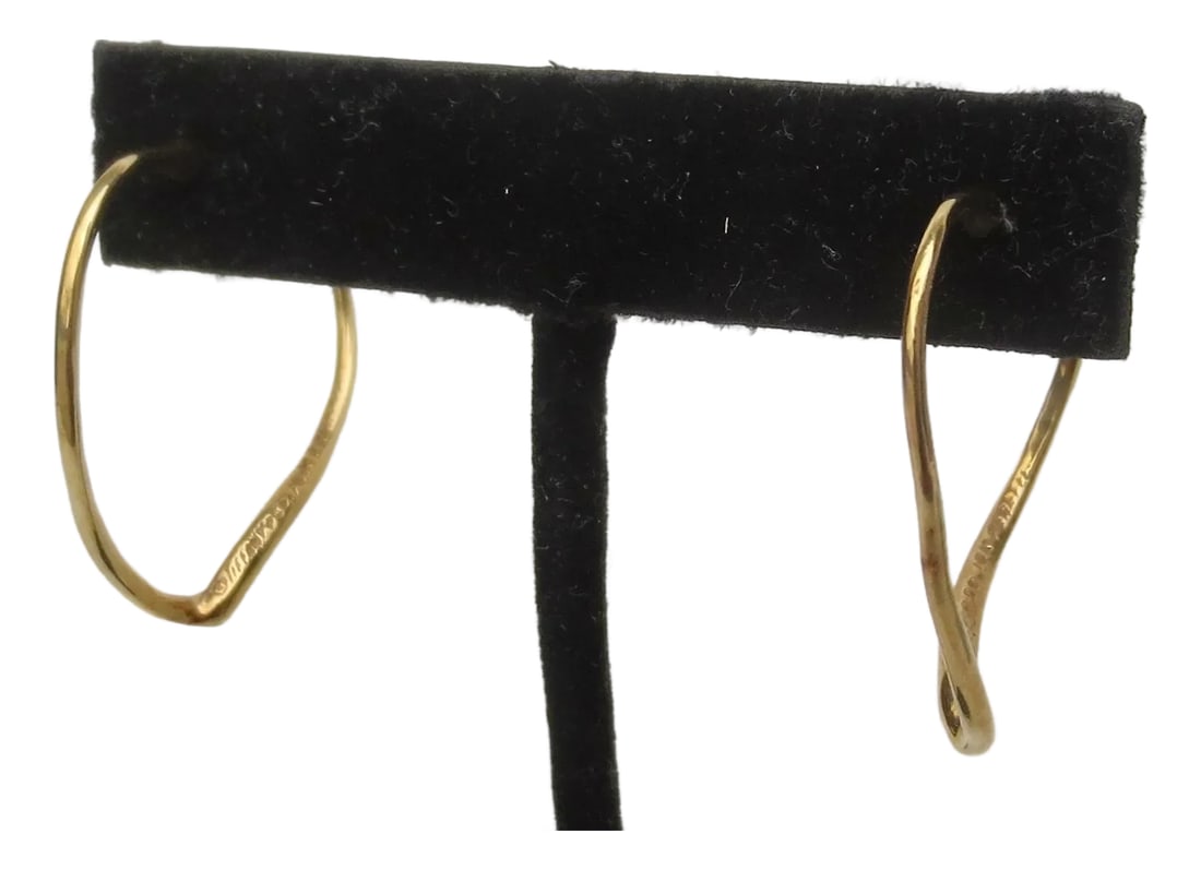 Vintage Elsa Peretti for Tiffany & Co. 24Kt. Earrings: 18kt. Yellow Gold Earrings, Heart by Peretti. marked 18 kt. Medium size weight s 3.8 Dwt. Classic and immediately recognizable Peretti Modern style. Excellent condition. Marked to the inner face of