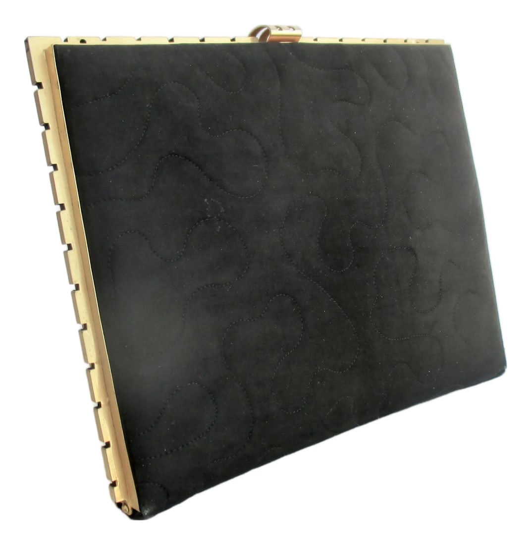 Black Velor/Suede Clutch With Gold Metal Trim: Matt Black velor or ultra suede with gilt metal frame, evening clutch. Machine-tooled design with an aoemba stitched pattern over the outside. Inside the purse opens to a small pocket mirror and