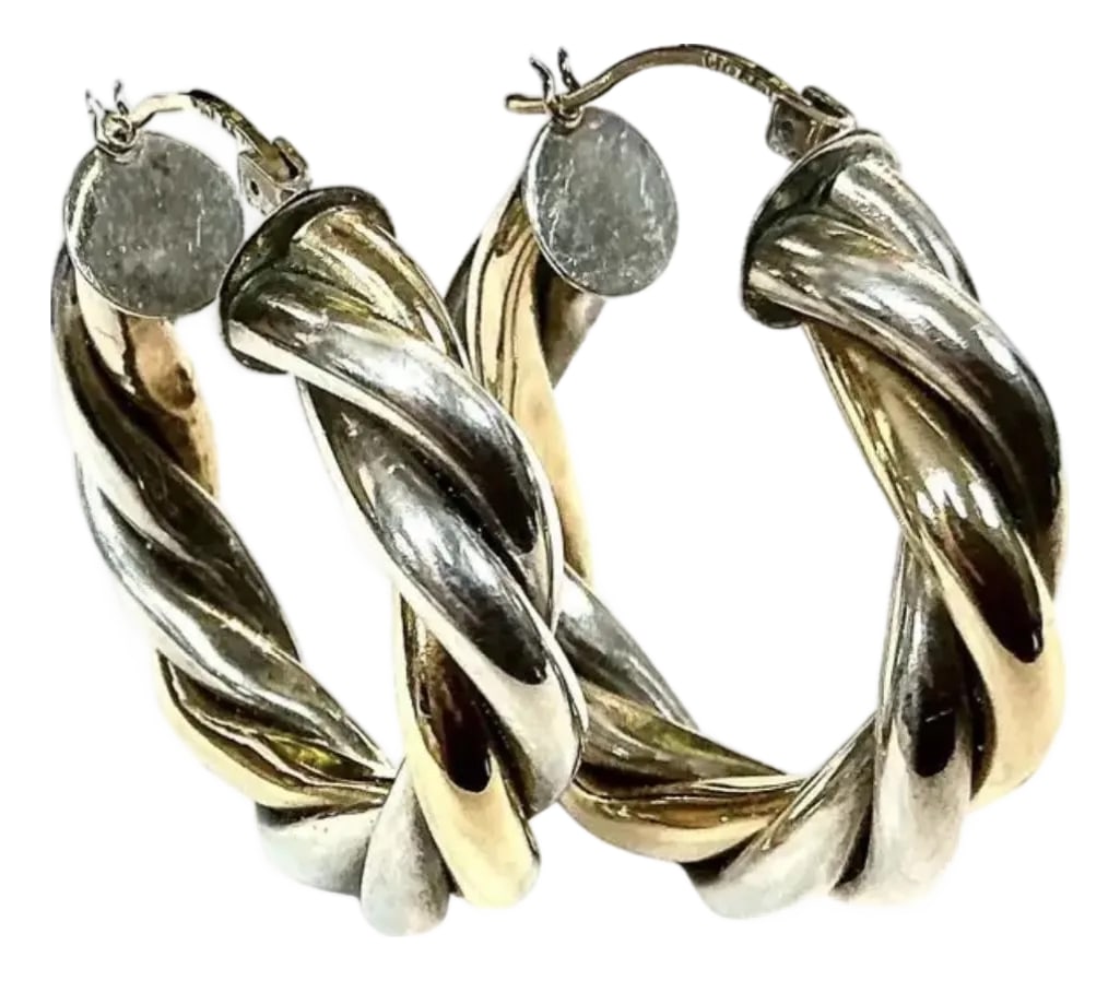 Vintage 14k Gold and Sterling Silver Twisted Rope Hoop Earrings: Vintage 14 Gold and Sterling Silver Hoop Earrings feature a bold, twisted rope design that adds depth and texture. Hinged clasp ensures secure and comfortable fastening. 8.28 grams total weight of